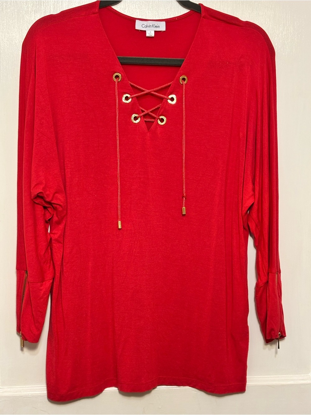 Calvin Klein Red Lace-Up V-Neck Long Sleeve Top with Gold Accents
